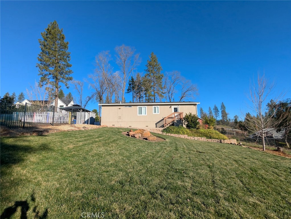 1658 Jaramillo Lane Paradise, CA 95969 - Photo 44 of 54 a view of a house with a yard