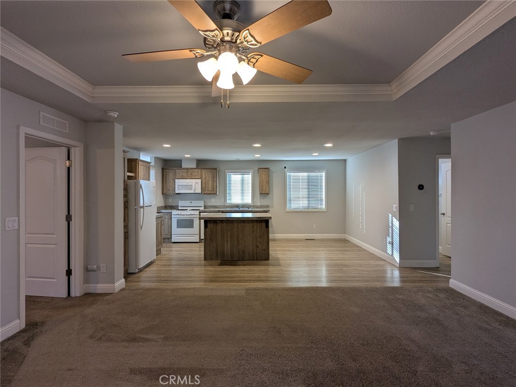 1658 Jaramillo Lane Paradise, CA 95969 - Photo 7 of 54 a view of kitchen and empty room with wooden floor