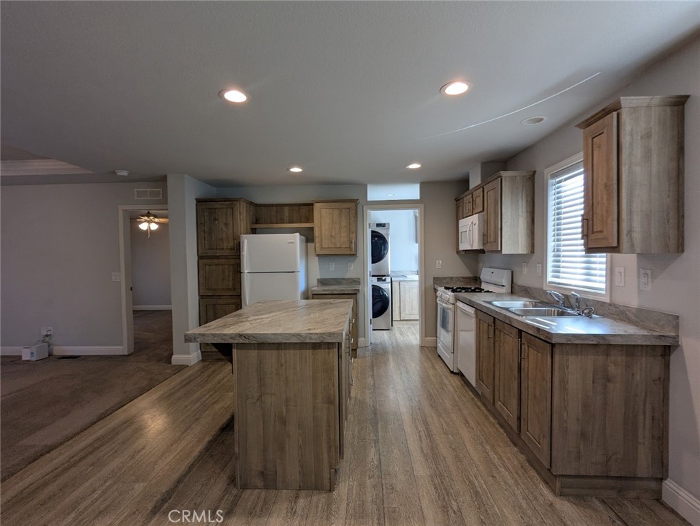 1658 Jaramillo Lane Paradise, CA 95969 - Photo 10 of 54 a kitchen with stainless steel appliances a sink a stove top oven a counter space and cabinets