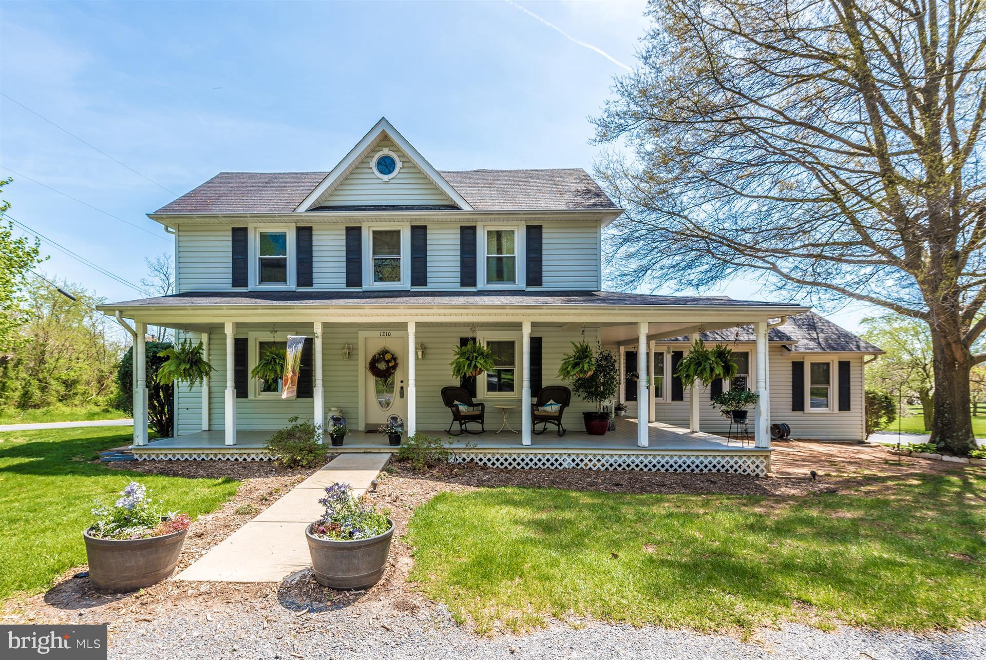 1210 Florence Road Mount Airy, MD 21771 - Photo 2 of 30 a front view of a house with a yard garden and outdoor seating