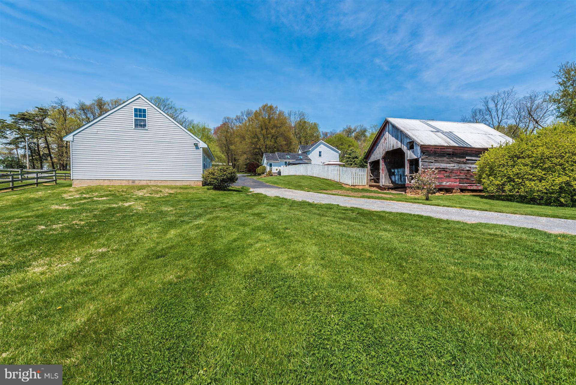 1210 Florence Road Mount Airy, MD 21771 - Photo 19 of 30 a front view of a house with a yard and garage
