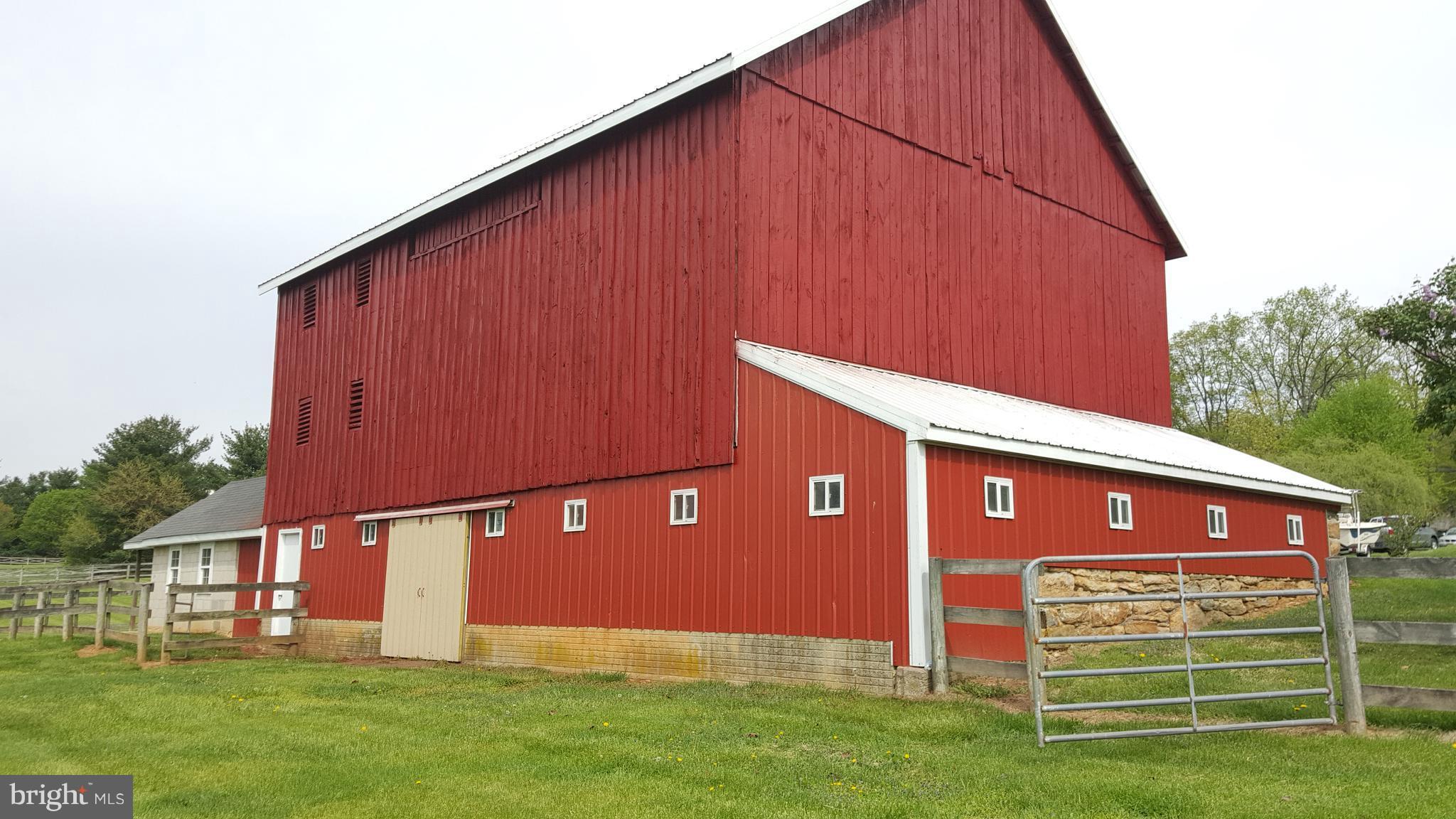 1210 Florence Road Mount Airy, MD 21771 - Photo 26 of 30 a front view of a house with a yard