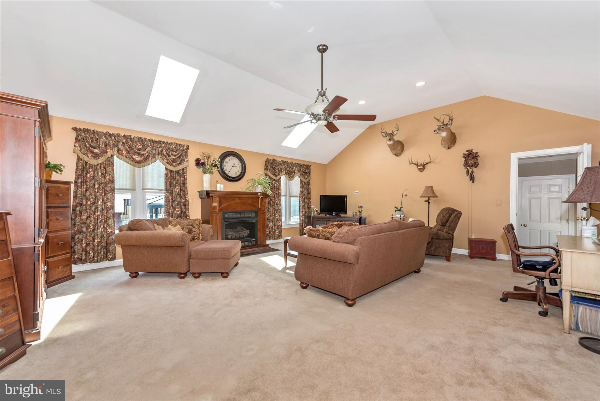 1210 Florence Road Mount Airy, MD 21771 - Photo 8 of 30 a living room with furniture and a large window