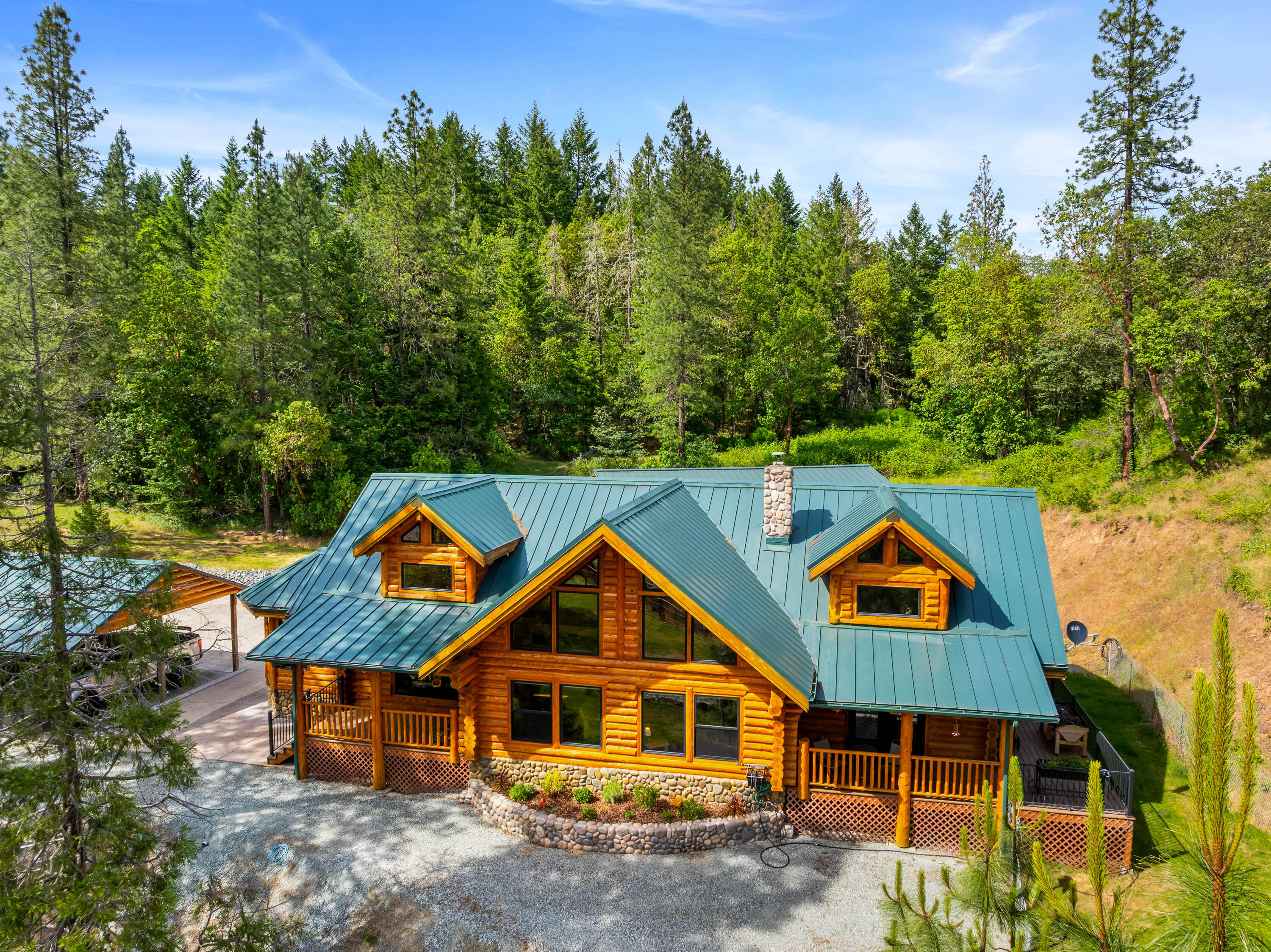 225 Eagle Ridge Road Canyonville, OR 97417 - Photo 1 of 52 an aerial view of a house