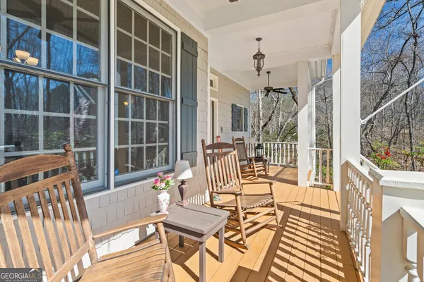 a bathroom with a sink toilet and mirror
