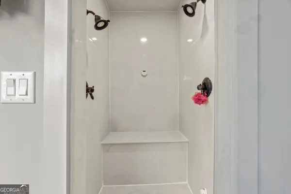 a view of a street with a tree