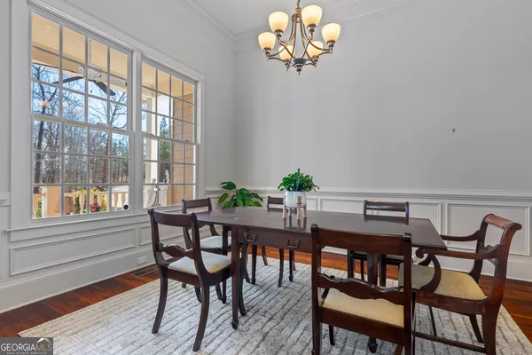 a view of a room with lots of furniture and lots of furniture