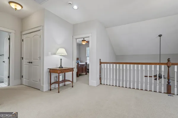 a room with gym equipment and a flat screen tv