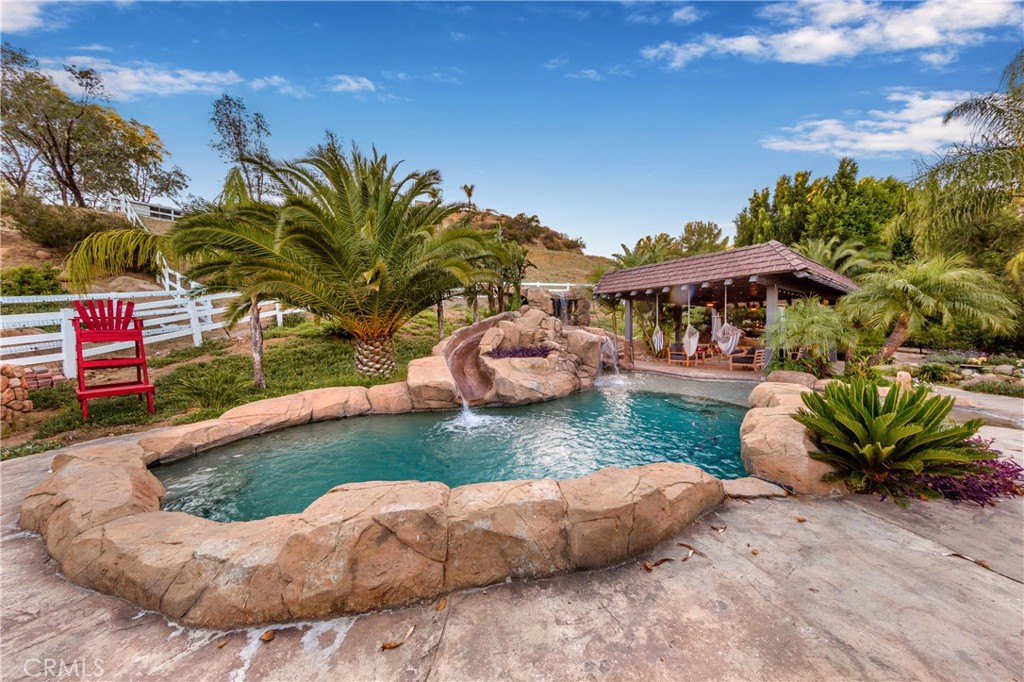 85 Saddlebow Road Bell Canyon, CA 91307 - Photo 55 of 75 a view of a backyard with plants and patio