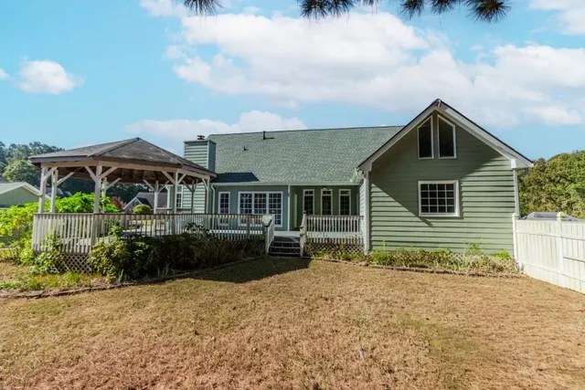 a view of house with outdoor space