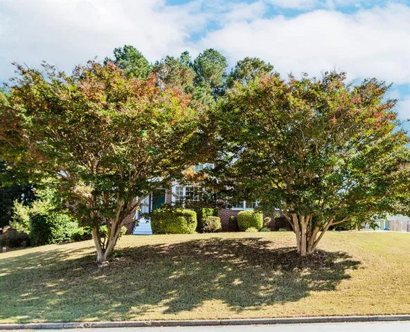 a view of a wooden deck with a patio