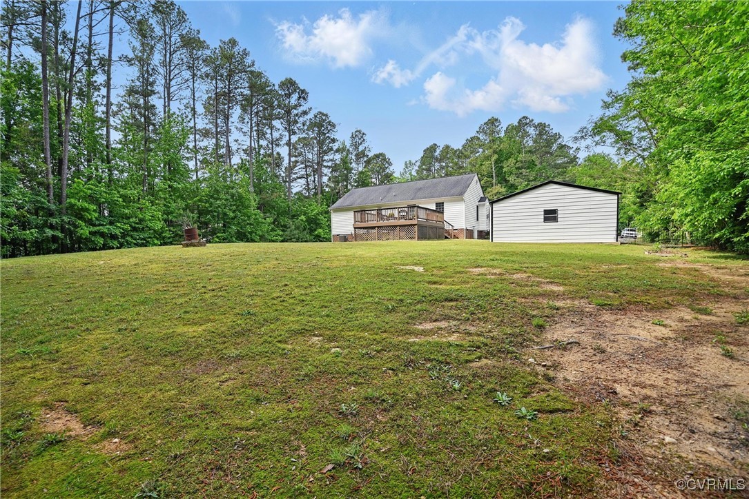 14609 Gatewood Road Dewitt, VA 23840 - Photo 23 of 25 View of grassy yard featuring a deck