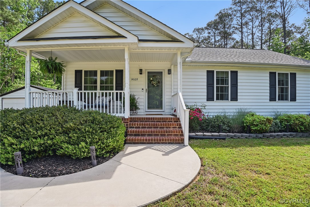 14609 Gatewood Road Dewitt, VA 23840 - Photo 4 of 25 View of front of house with a porch, a front yard,