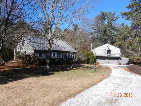 78 Alley Road Rochester, MA 02770 - Photo 1 of 11 a view of a house with a yard covered in snow