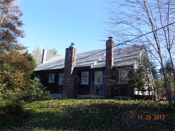 78 Alley Road Rochester, MA 02770 - Photo 3 of 11 a front view of a house with garden