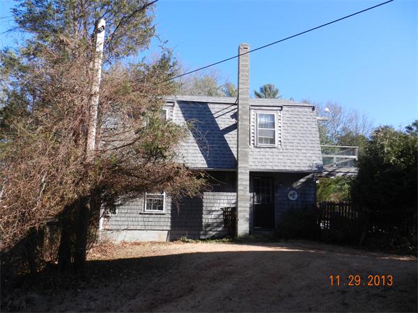78 Alley Road Rochester, MA 02770 - Photo 10 of 11 a front view of a house with a yard