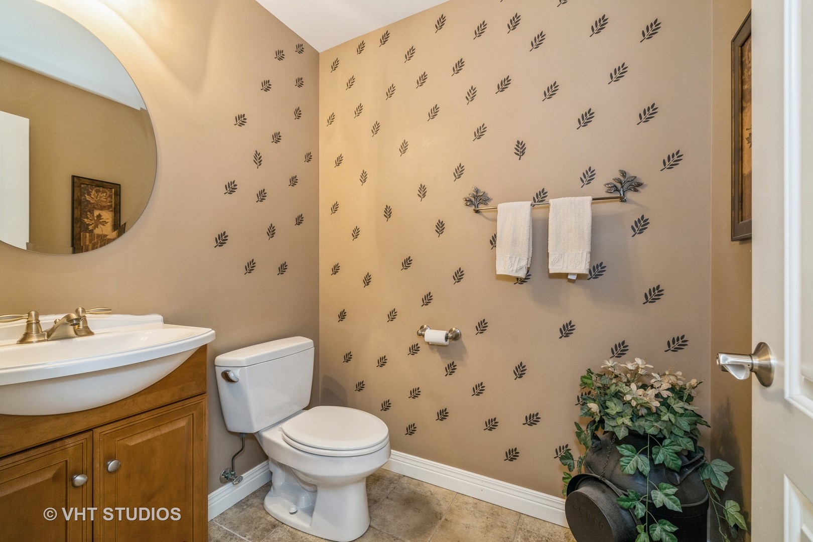 2267 Caton Farm Road Crest Hill, IL 60403 - Photo 8 of 21 a white toilet sitting next to a bathroom sink