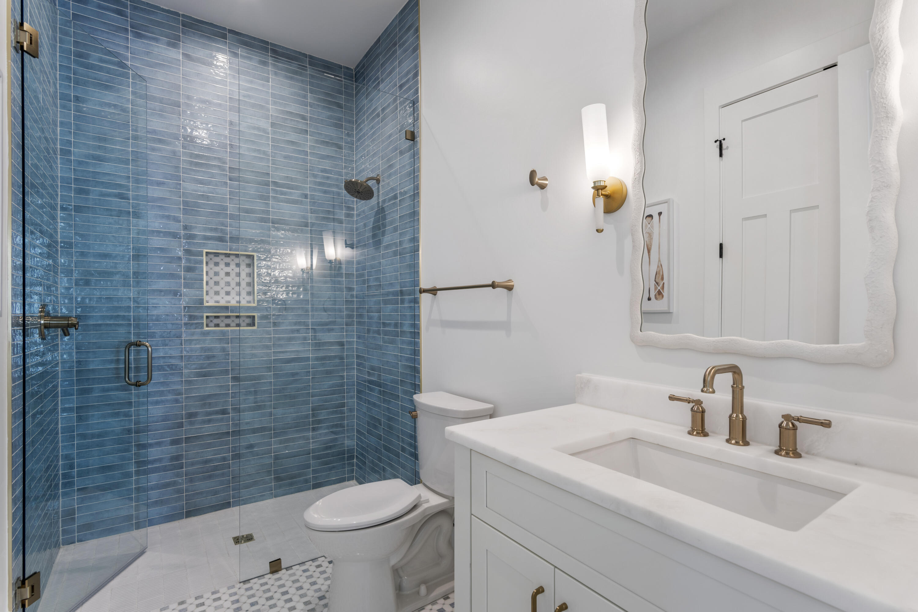 140 South Wall Street Inlet Beach, FL 32461 - Photo 34 of 53 a bathroom with a sink a toilet and shower