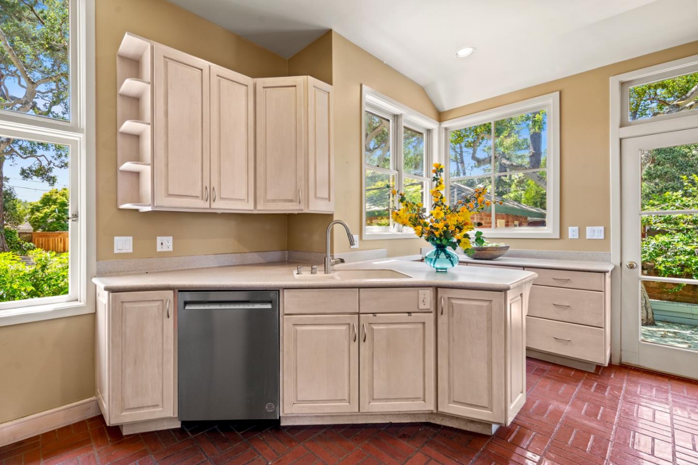 0 Junipero Carmel, CA 93923 - Photo 15 of 42 a kitchen with white cabinets and a window