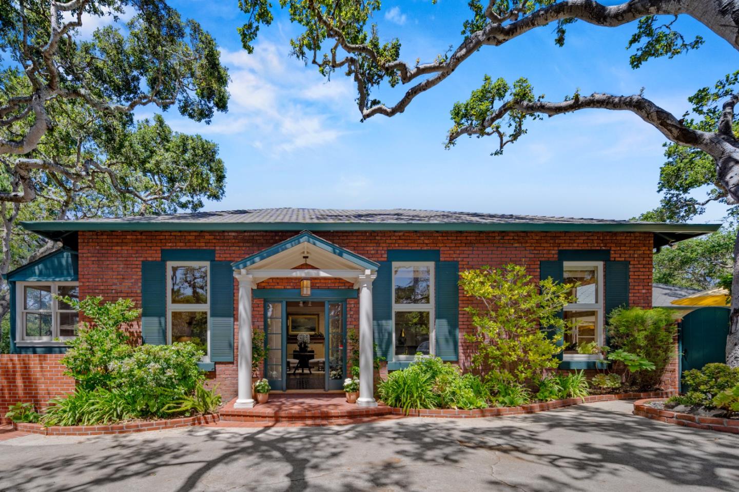 0 Junipero Carmel, CA 93923 - Photo 2 of 42 front view of a house with a tree