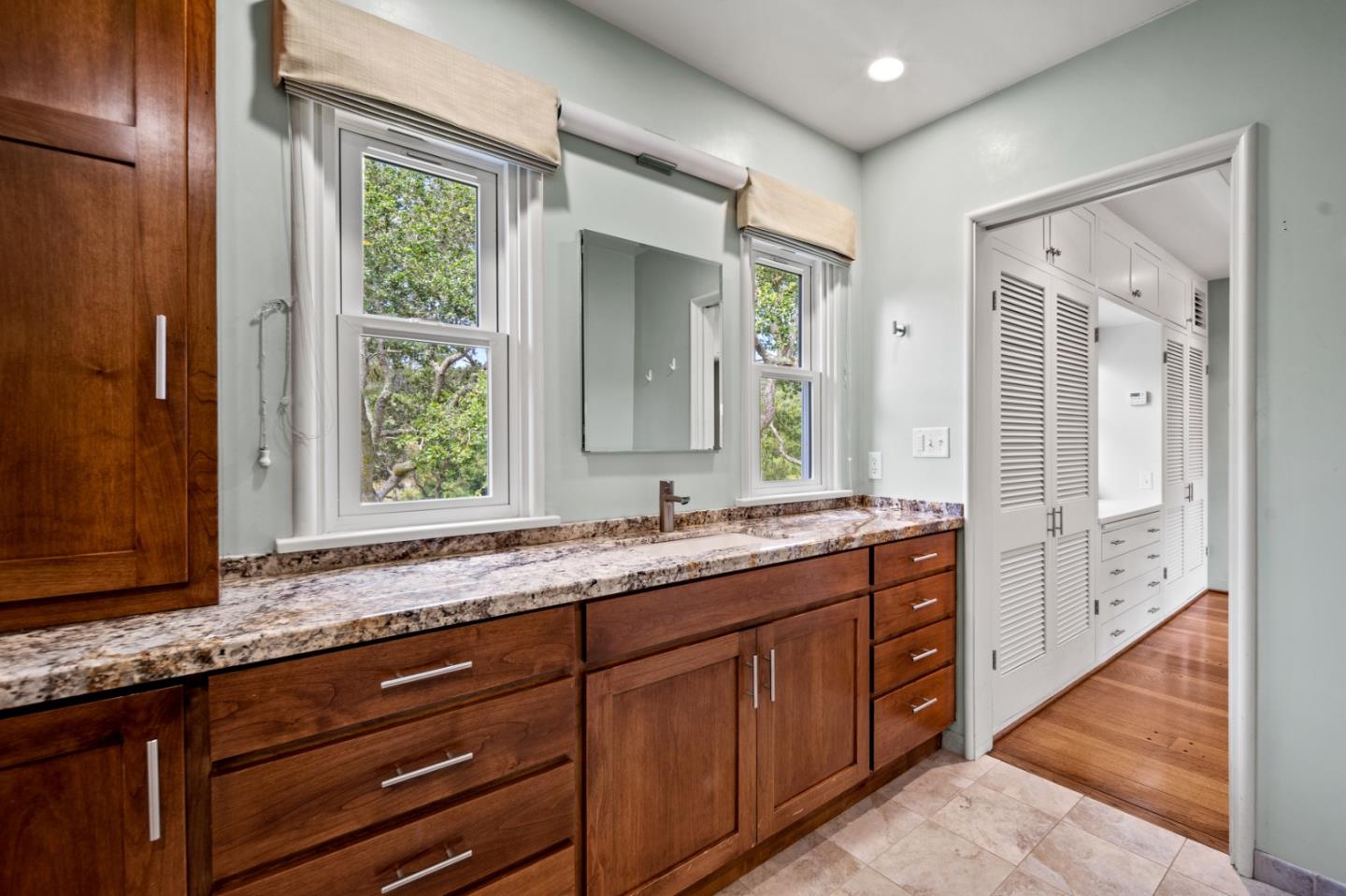 0 Junipero Carmel, CA 93923 - Photo 29 of 42 a bathroom with a granite countertop sink mirror and double