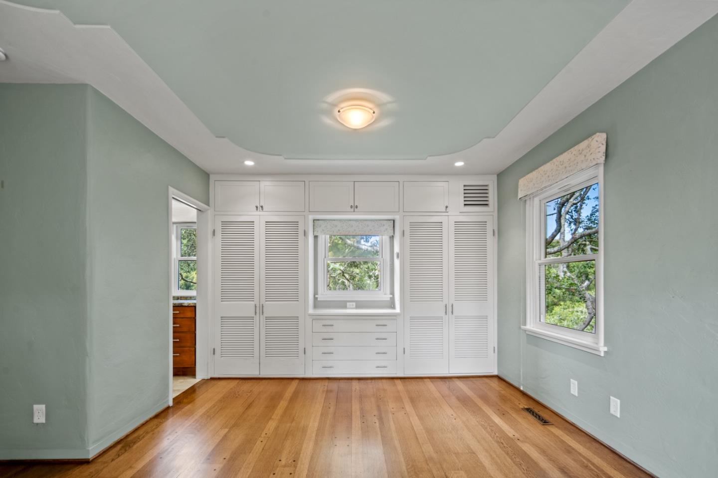 0 Junipero Carmel, CA 93923 - Photo 33 of 42 wooden floor in an empty room with a window