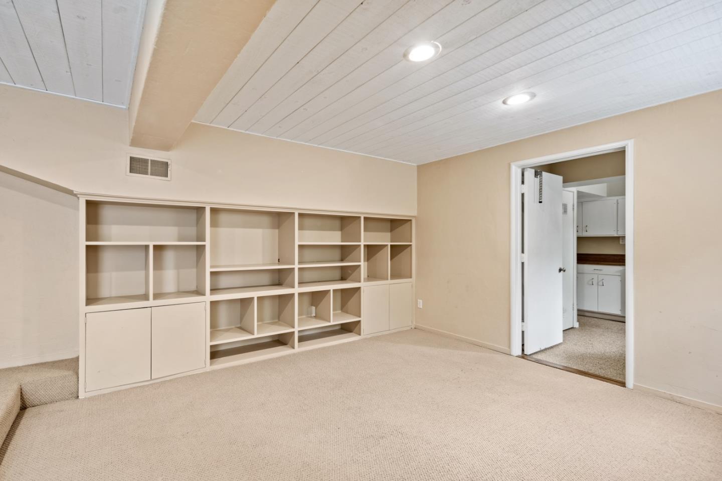 0 Junipero Carmel, CA 93923 - Photo 35 of 42 an empty room with a empty shelves and cabinet