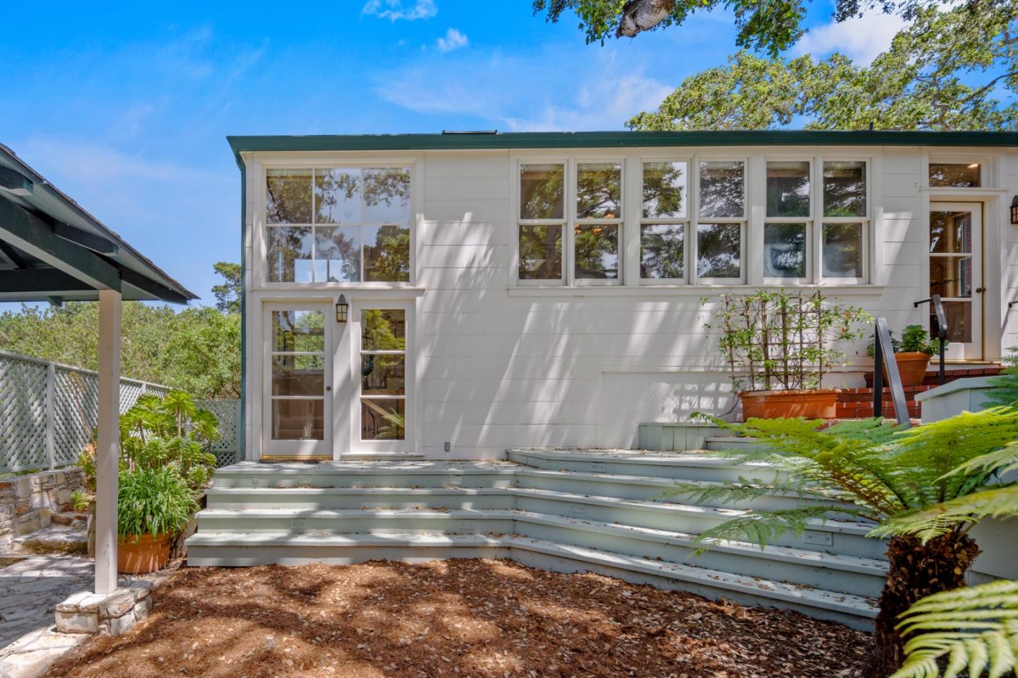 0 Junipero Carmel, CA 93923 - Photo 38 of 42 a front view of a house with a garden