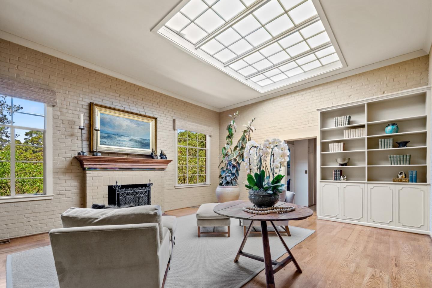 0 Junipero Carmel, CA 93923 - Photo 7 of 42 a living room with furniture a flat screen tv and a fireplace