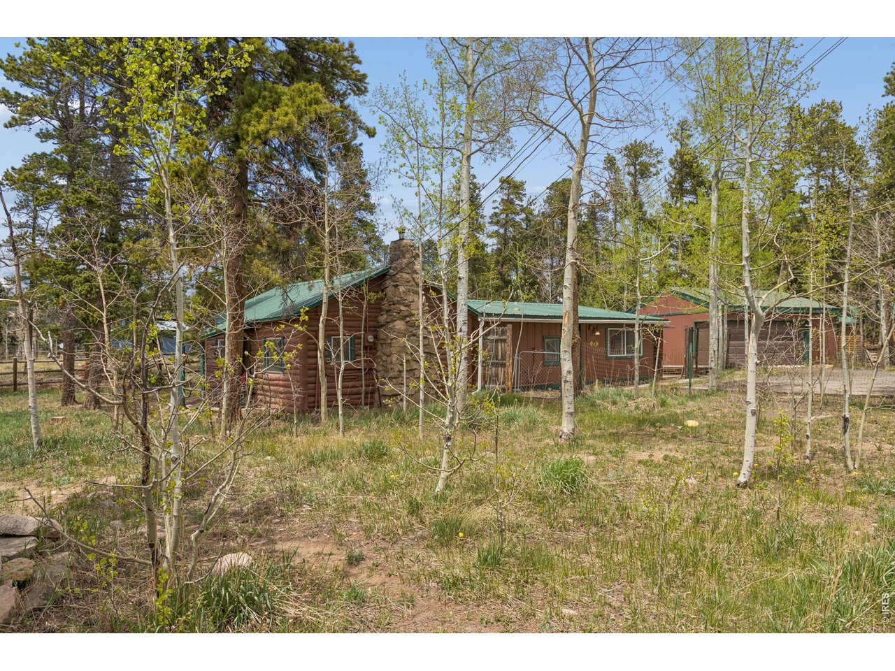 27 Gap Road Black Hawk, CO 80422 - Photo 27 of 36 a backyard of a house with lots of green space