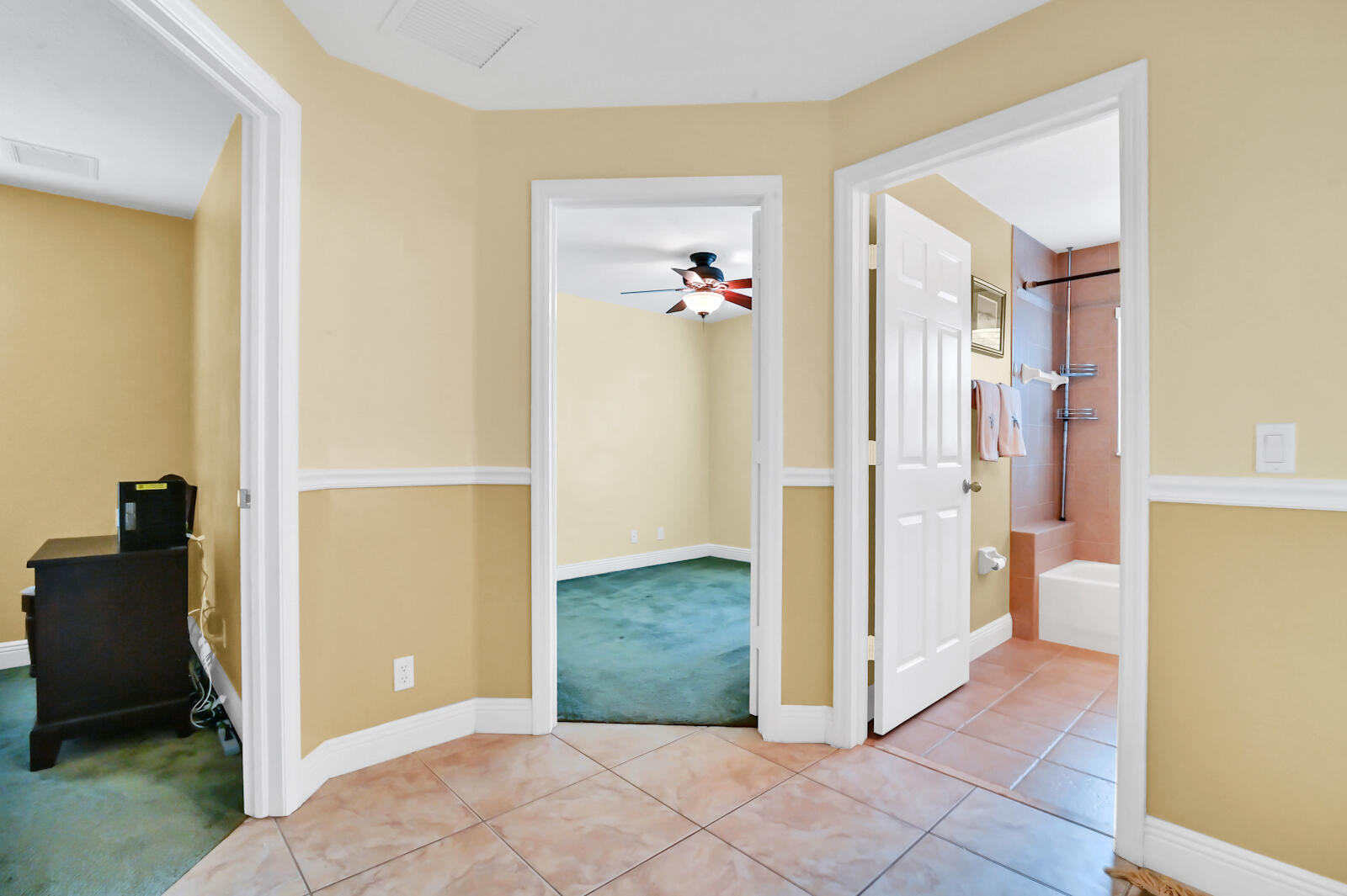 244 Clocktower Drive Jupiter, FL 33458 - Photo 22 of 36 a view of a hallway with closet and a livingroom view