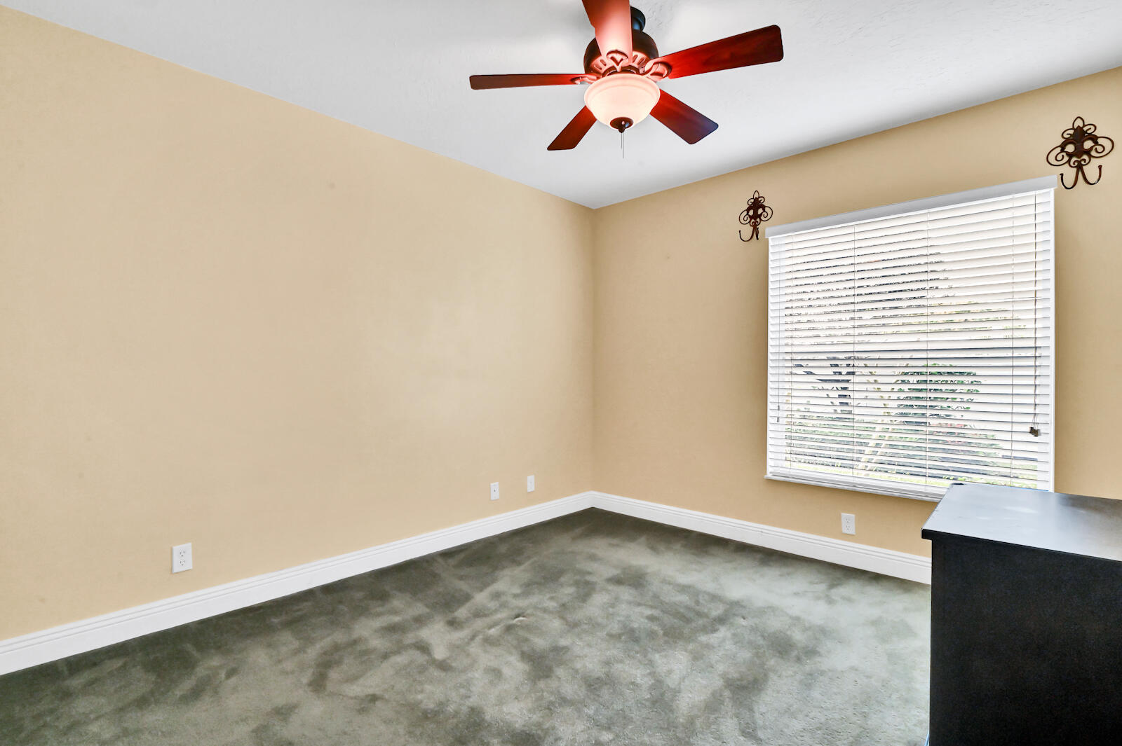 244 Clocktower Drive Jupiter, FL 33458 - Photo 30 of 36 a view of an empty room with a window