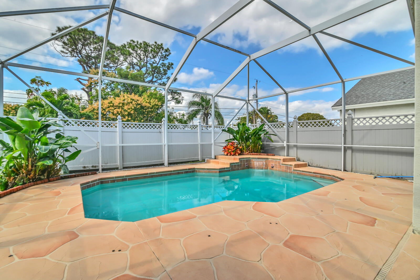 244 Clocktower Drive Jupiter, FL 33458 - Photo 32 of 36 a view of a backyard
