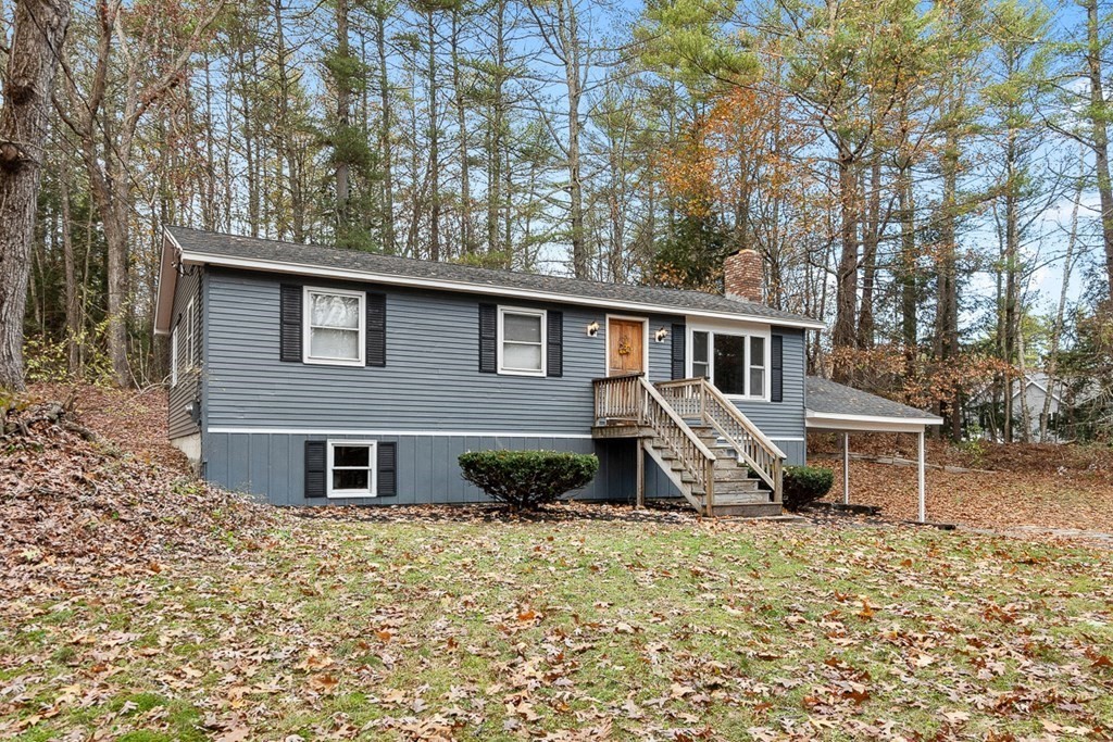 front view of a house with a yard