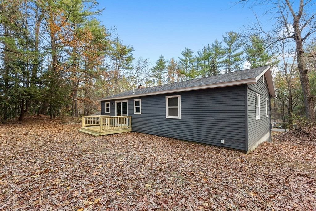 122 Townsend Road Shirley, MA 01464 - Photo 29 of 34 a front view of a house with a garden