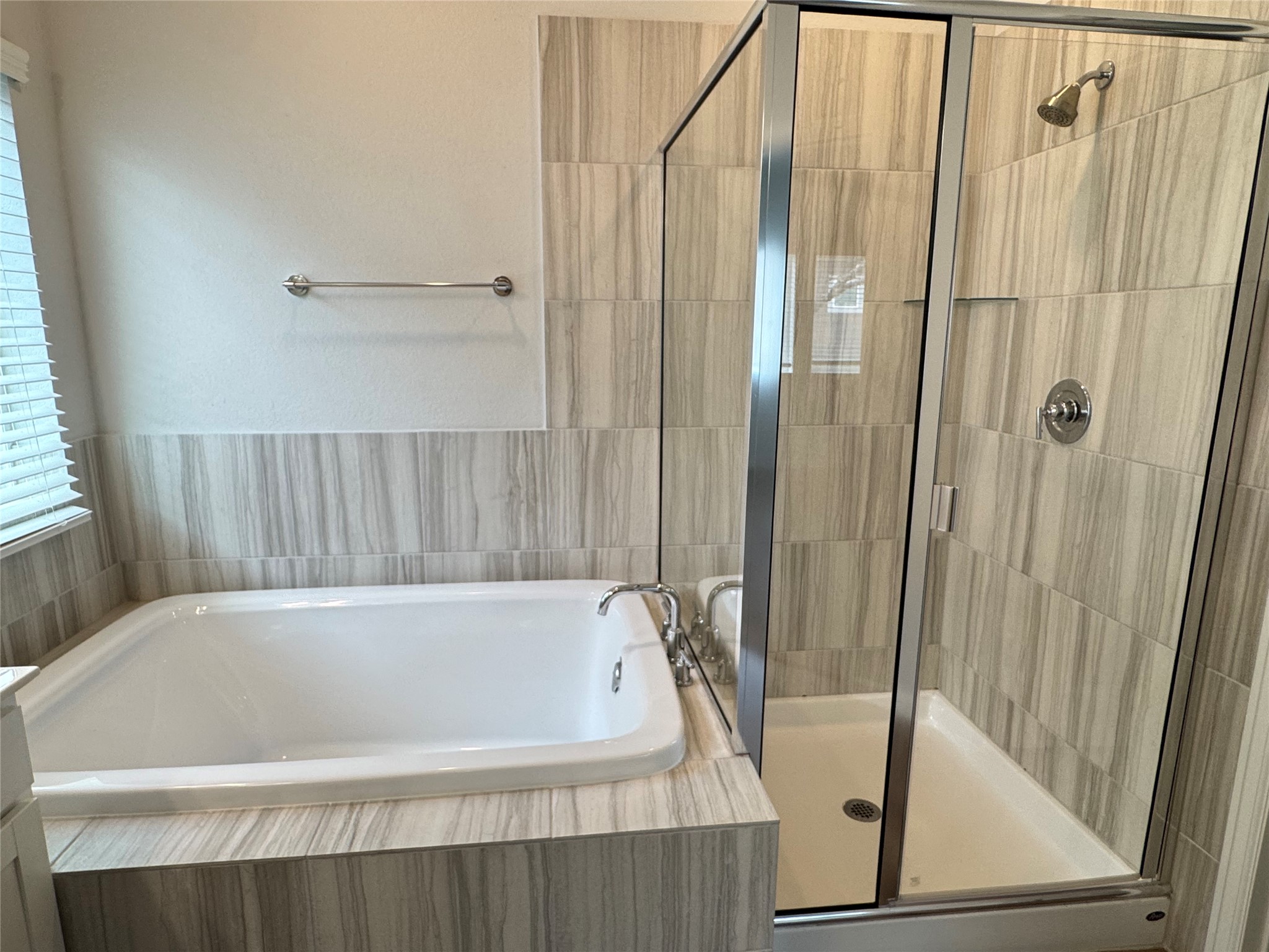 3000 Chisholm Trail Road, Unit 103 Round Rock, TX 78681 - Photo 18 of 32 Full bathroom with a bath and a stall shower