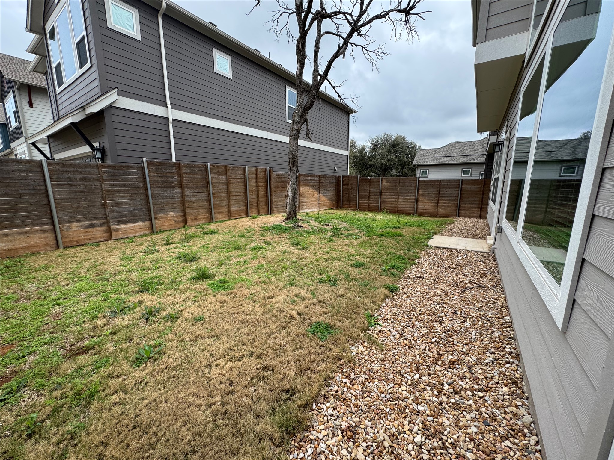 3000 Chisholm Trail Road, Unit 103 Round Rock, TX 78681 - Photo 30 of 32 a view of backyard with green space