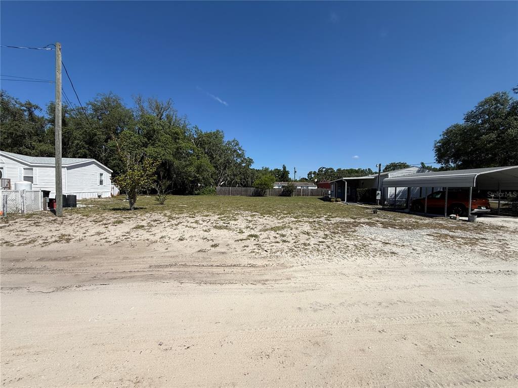 Codel Loop New Port Richey, FL 34654 - Photo 3 of 9 a view of a house with a yard