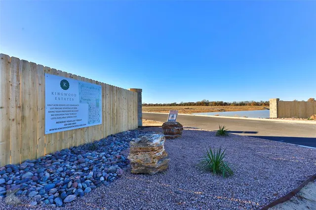 a view of a terrace with wooden fence