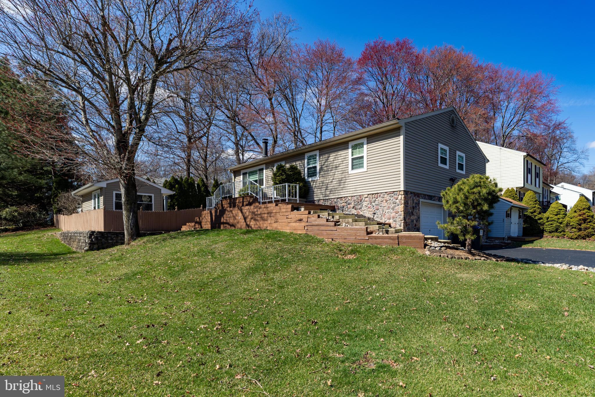 274 Birch Street Newark, DE 19711 - Photo 3 of 41 a view of a backyard with table and chairs and a large tree