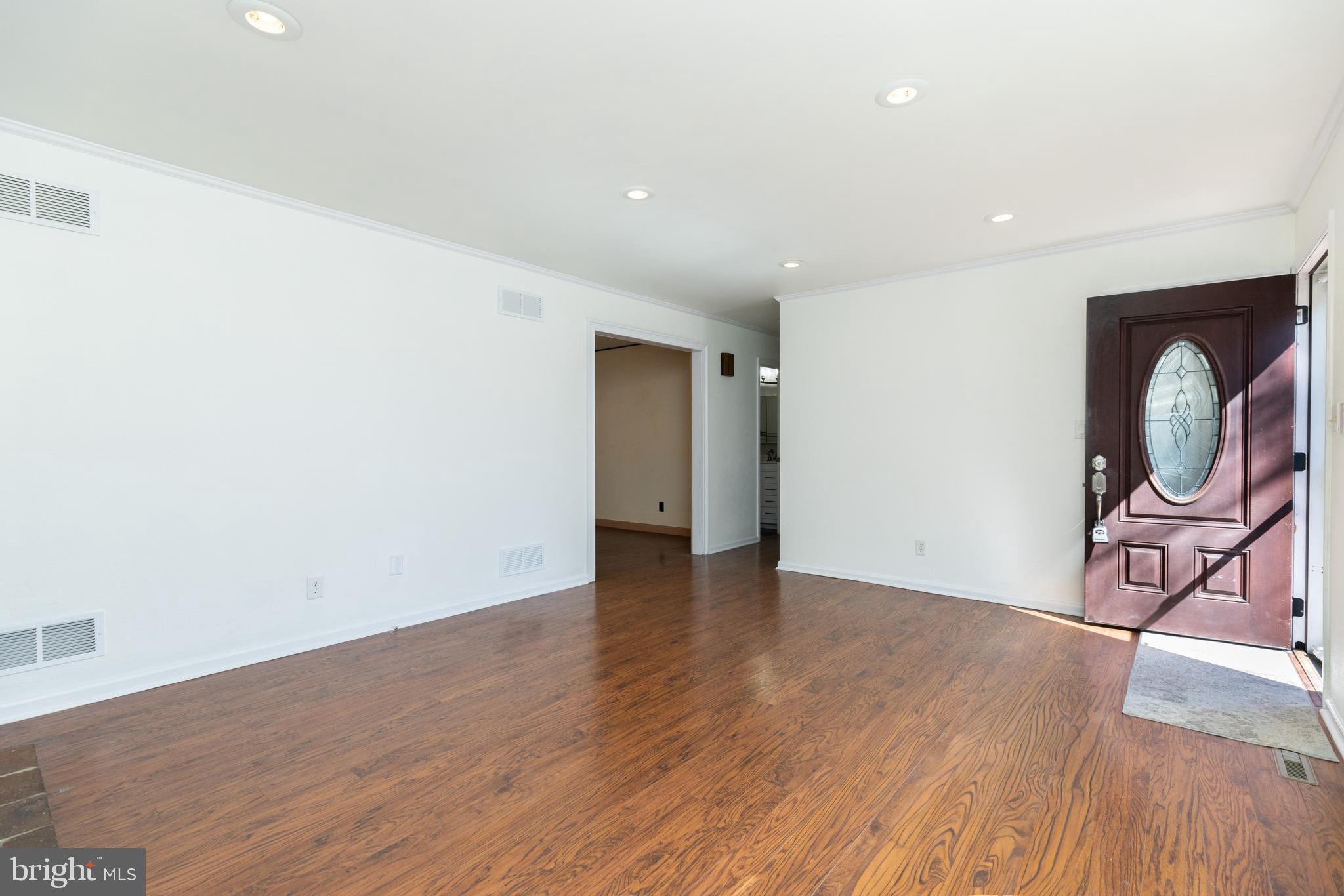 274 Birch Street Newark, DE 19711 - Photo 6 of 41 a view of a room with wooden floor and furniture