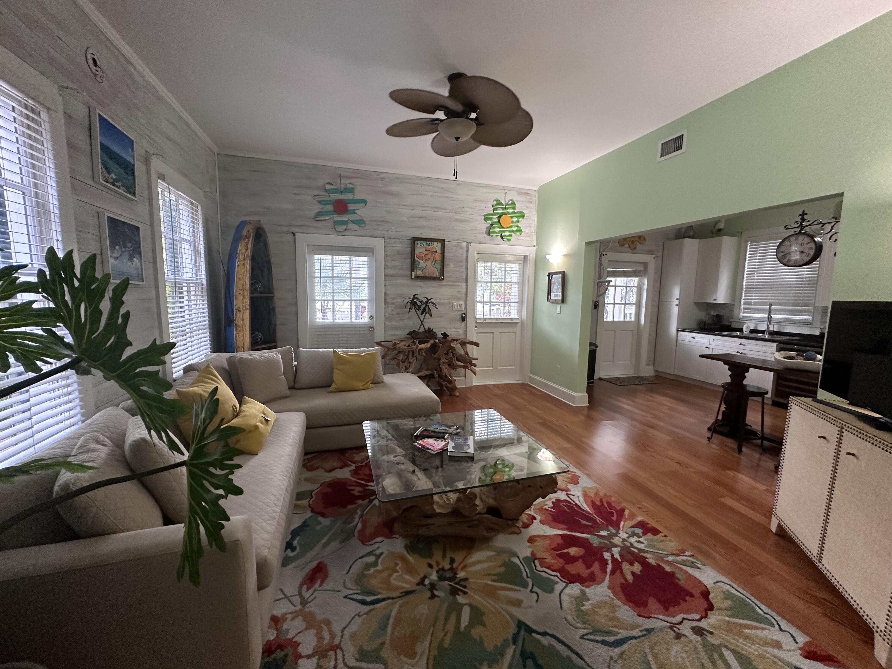 817 Eaton Street, Unit 1 Key West, FL 33040 - Photo 15 of 30 a living room with furniture and wooden floor