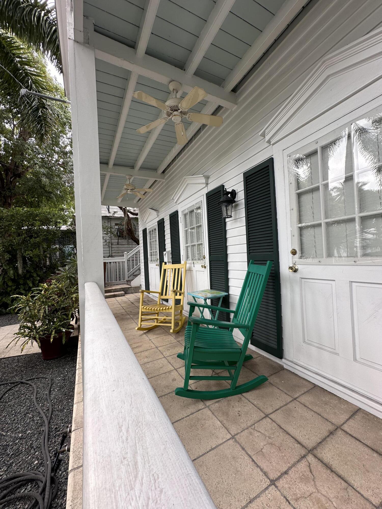 817 Eaton Street, Unit 1 Key West, FL 33040 - Photo 27 of 30 a view of a porch with furniture