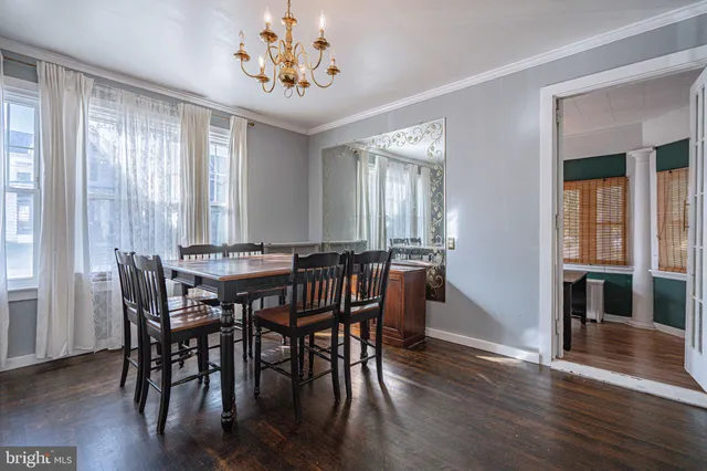 a view of a hallway with seating area