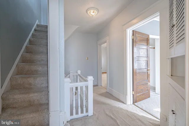 a view of livingroom with a ceiling fan and window