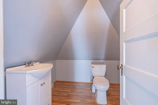 a view of a patio with a table chairs and a backyard