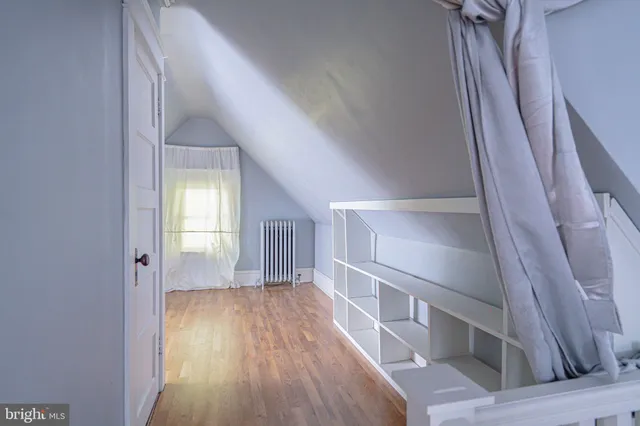 a view of a small yard with some trees