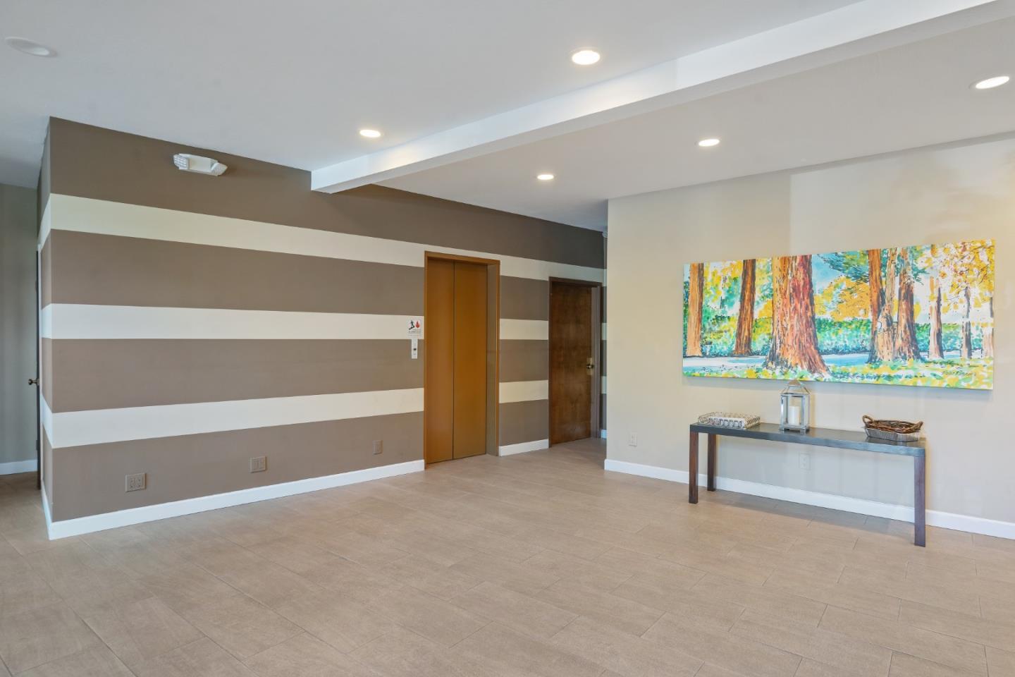 500 Almer Road, Unit 208 Burlingame, CA 94010 - Photo 5 of 30 a view of an empty room with a window
