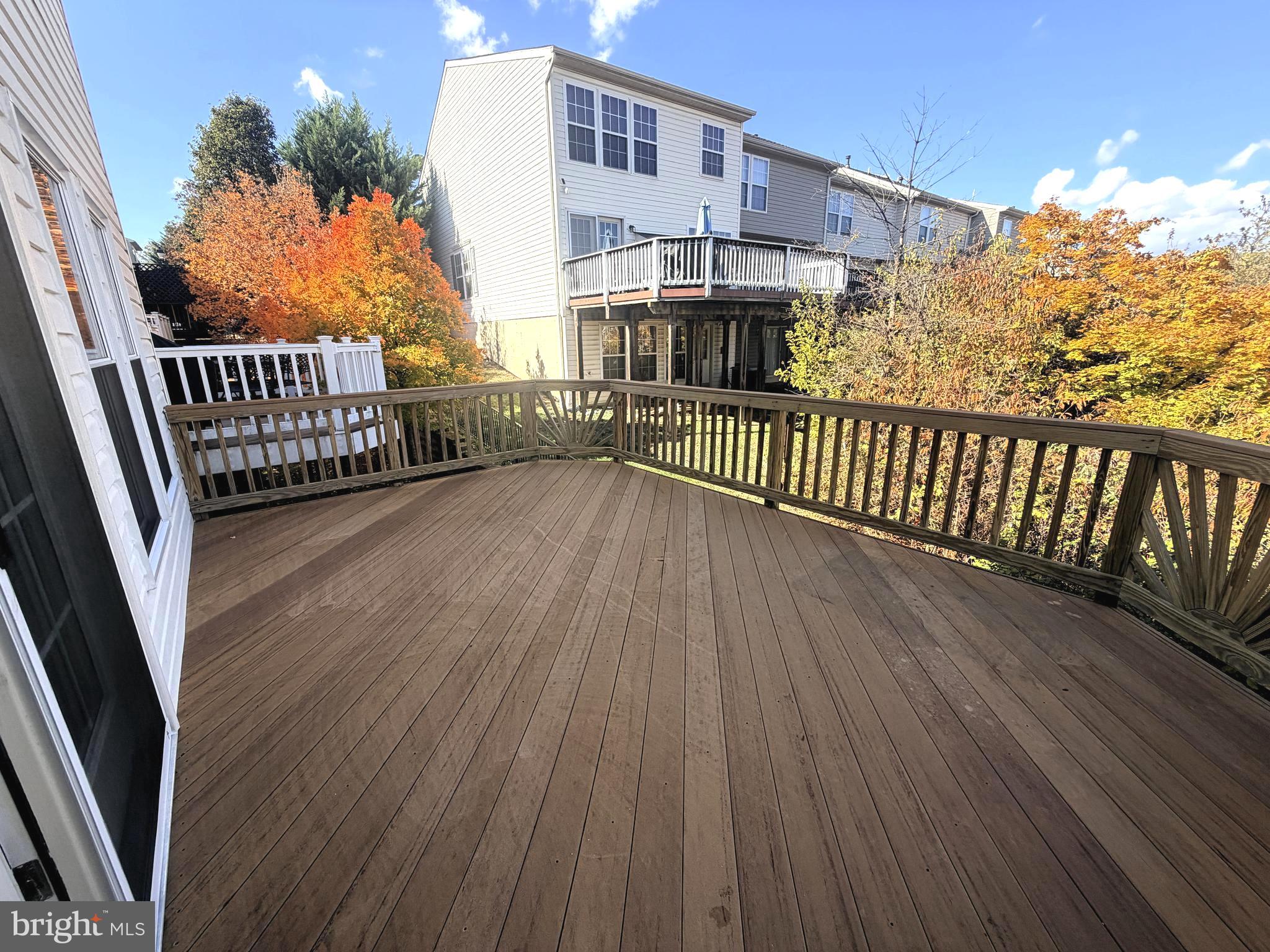 7088 Maiden Point Place, Unit 25 Elkridge, MD 21075 - Photo 14 of 29 a view of a balcony with wooden floor