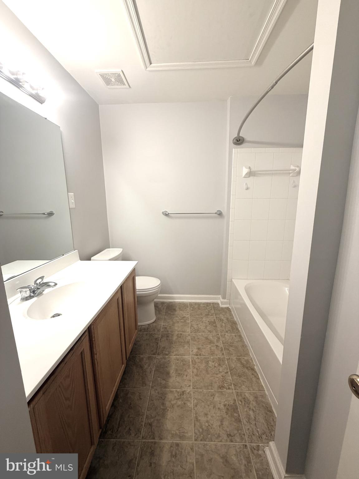 7088 Maiden Point Place, Unit 25 Elkridge, MD 21075 - Photo 18 of 29 a bathroom with a sink a toilet and shower